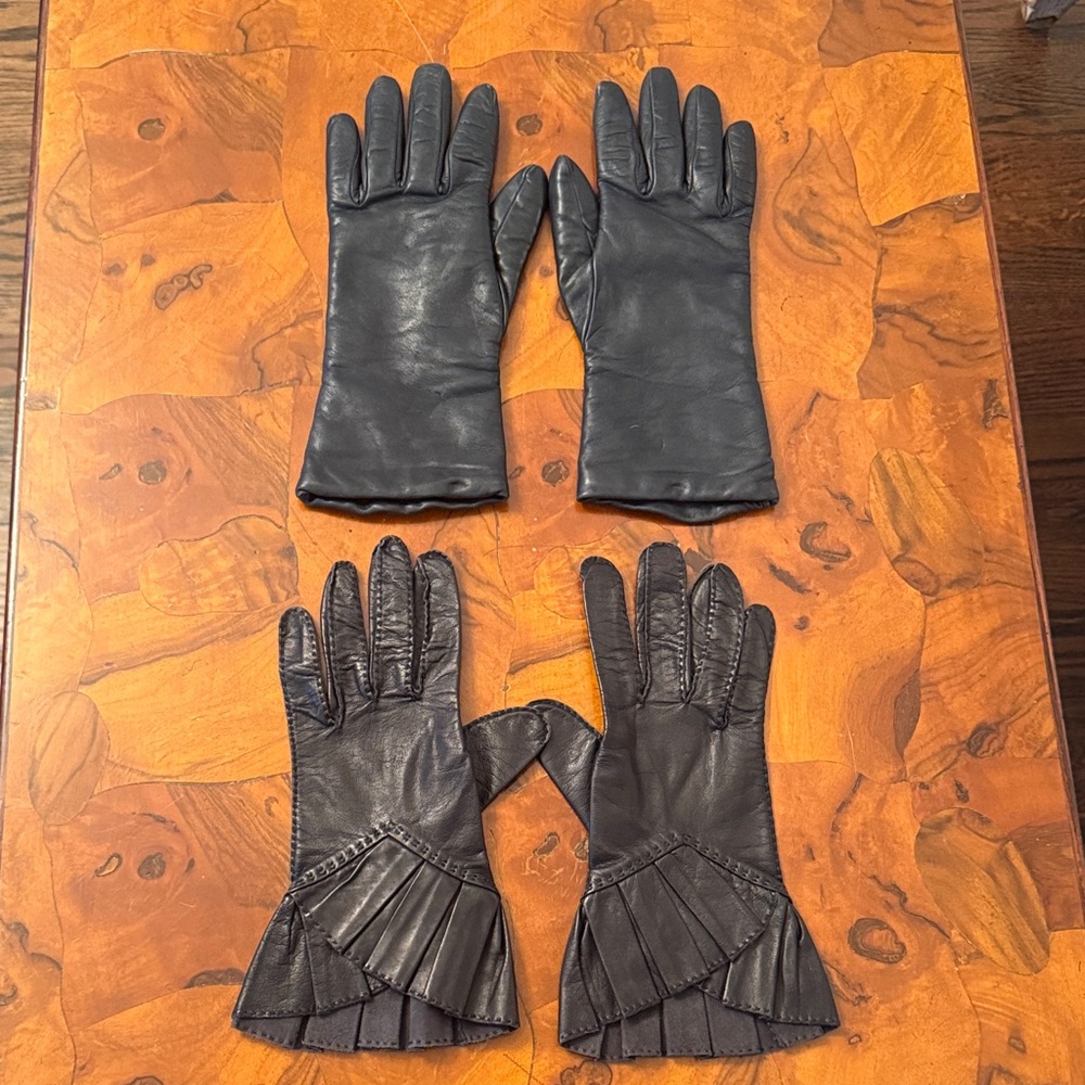 Lot 2 pairs of black leather gloves size 6 ( one is 6.5 marked but runs small